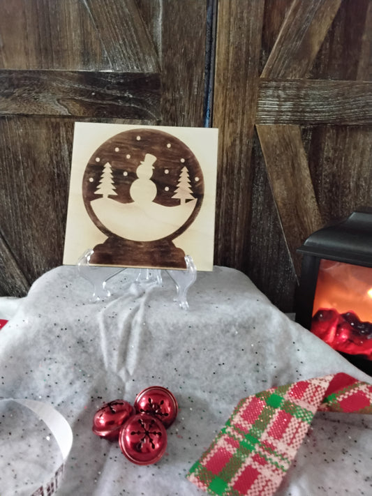 Snowman in a snow globe